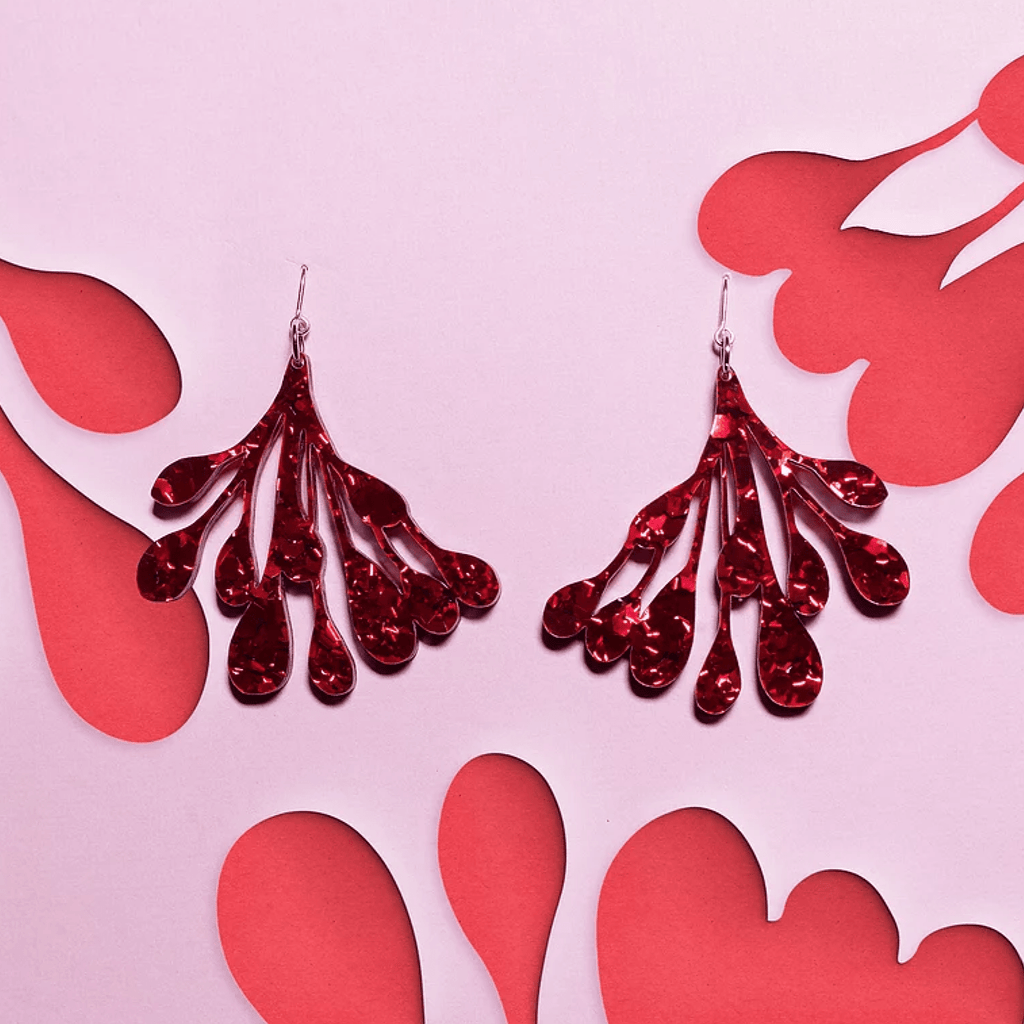 Acrylic Hanging Earrings - Red Glitter Breast Side View